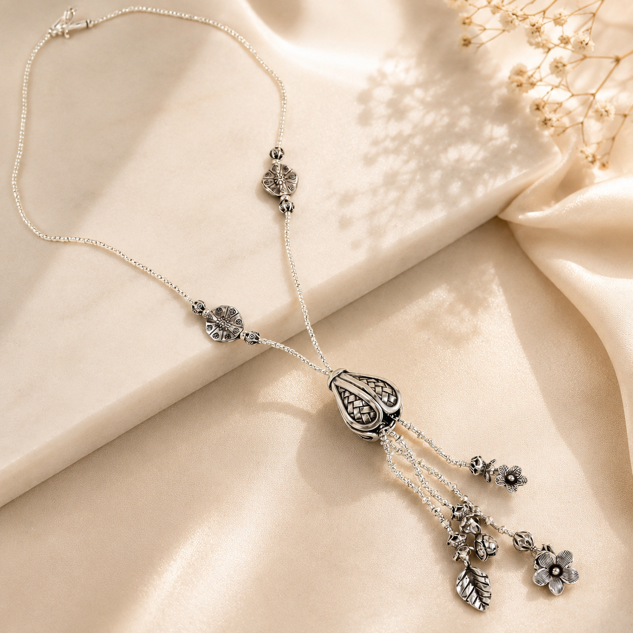 Nayra Elegant Floral Silver Necklace