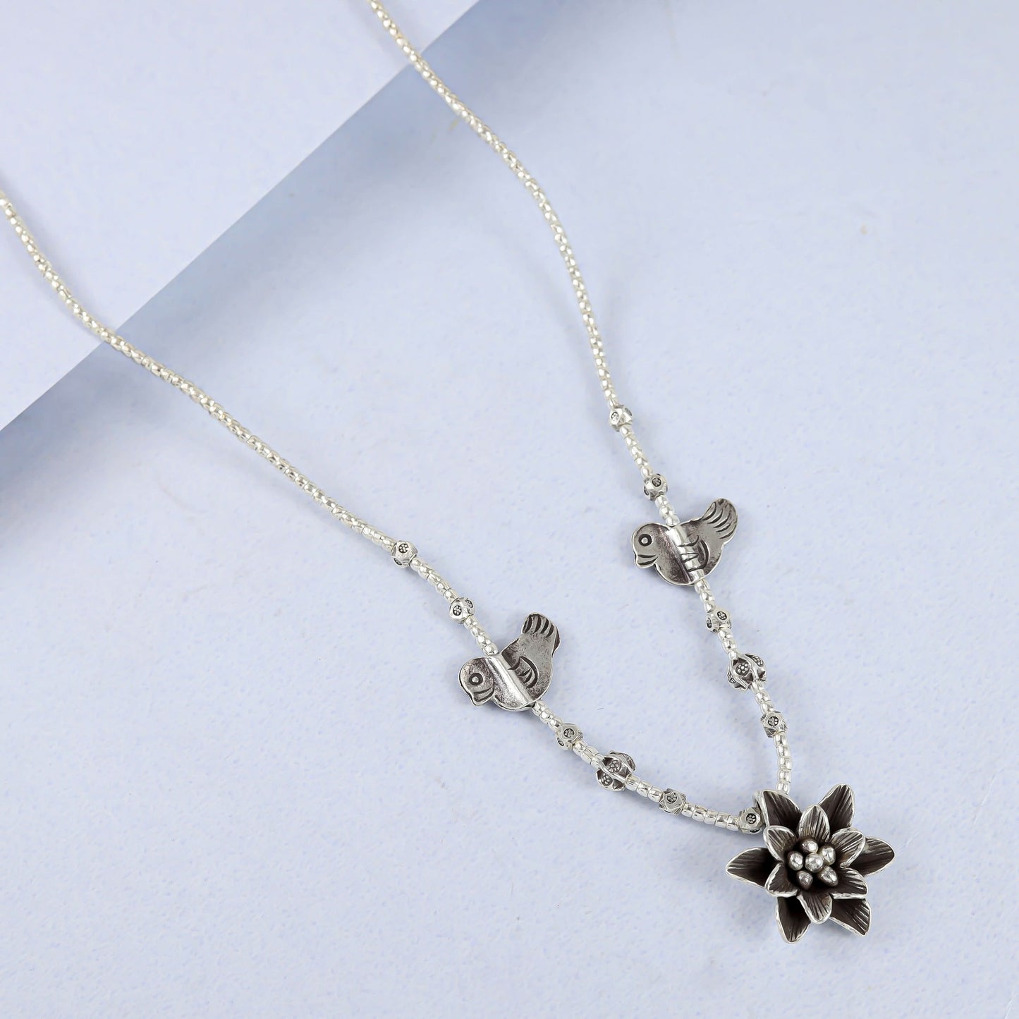 Gauri Silver Necklace With Birds And Floral Design
