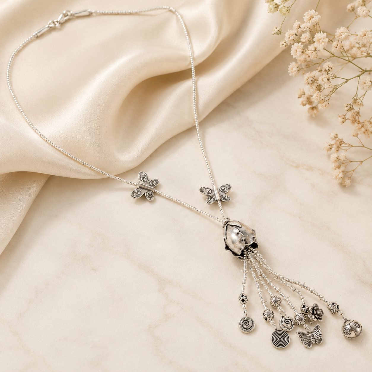 Silver Necklace With Intricate And Leaf Motifs