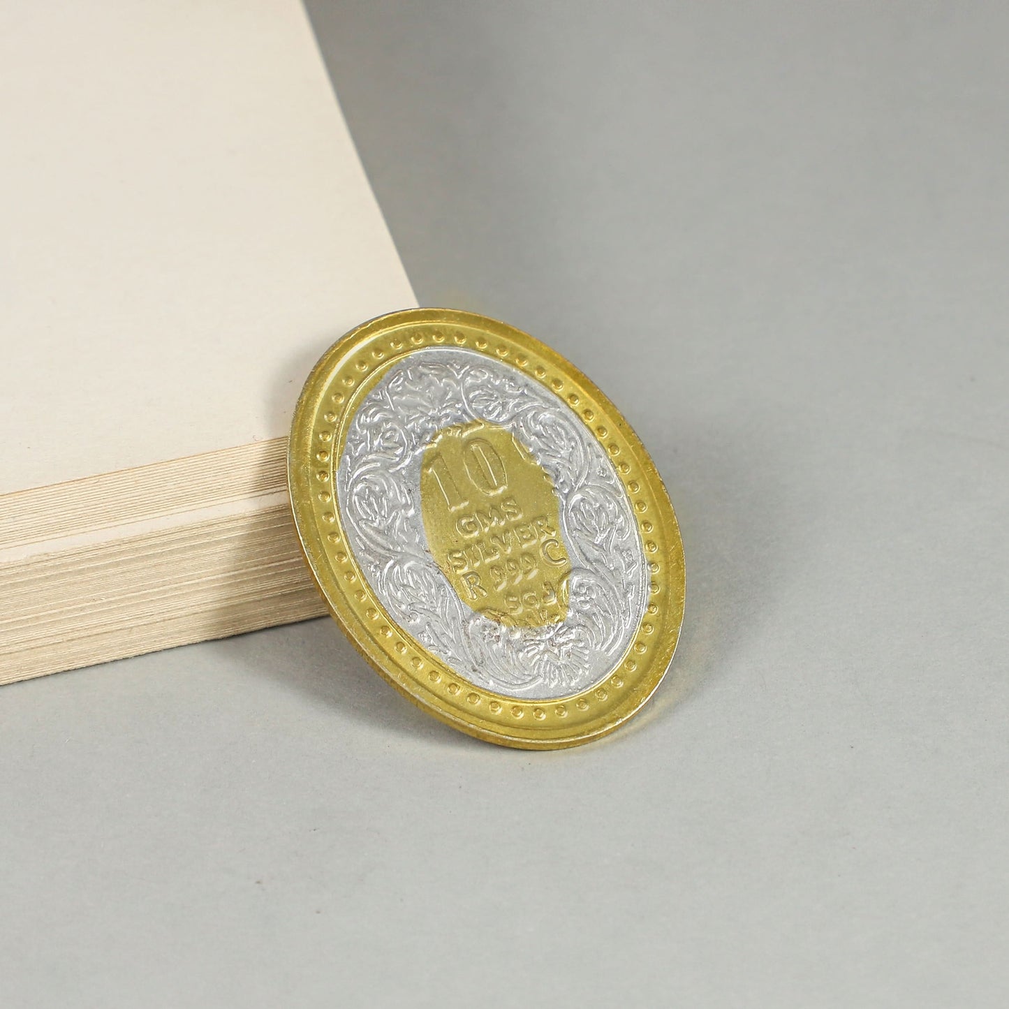 Golden Queen Coin- Elegant silver coin with intricate gold polish