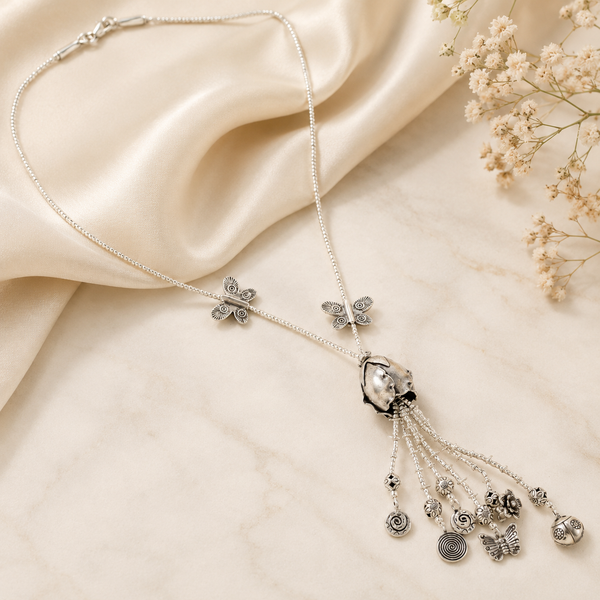 Silver Necklace With Intricate And Leaf Motifs