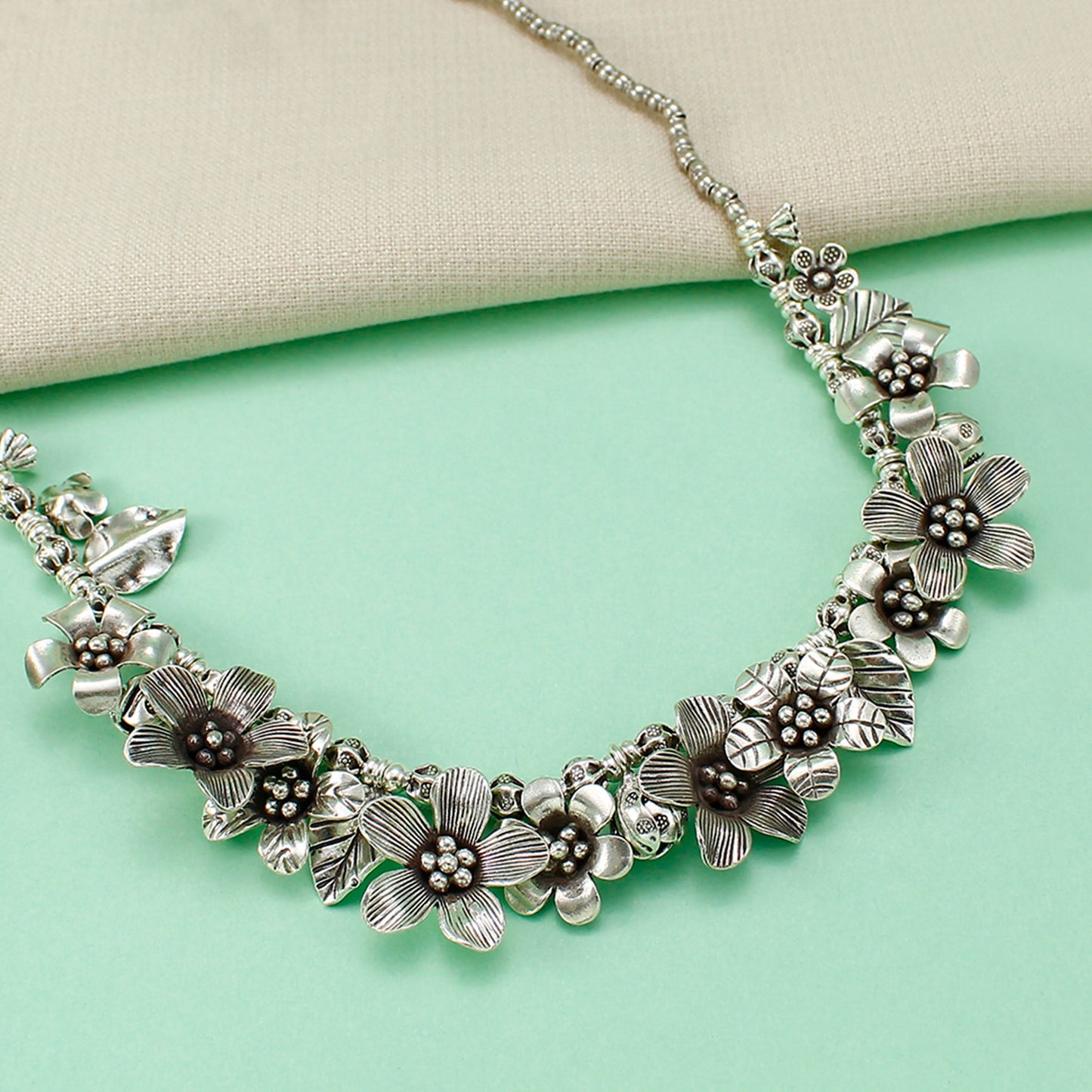 Kritika Bold Floral Motifs Silver Necklace