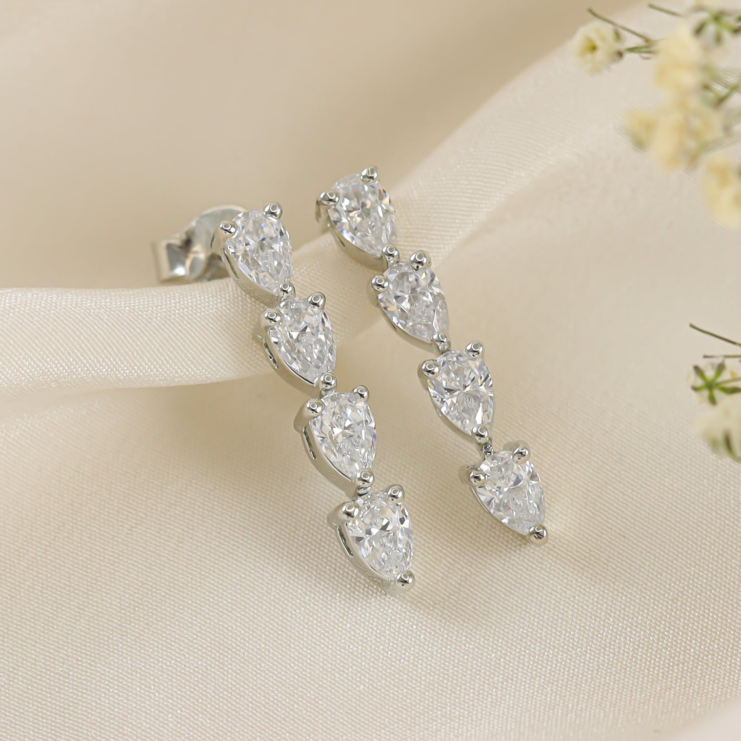 Pear-cut Silver Earrings with Swarovski Zirconia