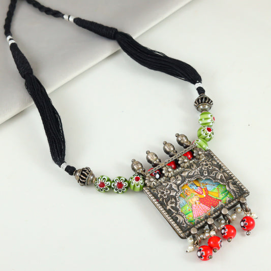 Aashka Green-Red Thread Tribal Silver Necklace With Hand Painted Deity Motif