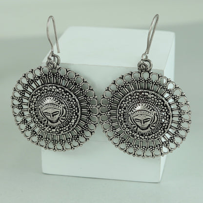 Shubha Tribal Silver Earrings With Deity Motif