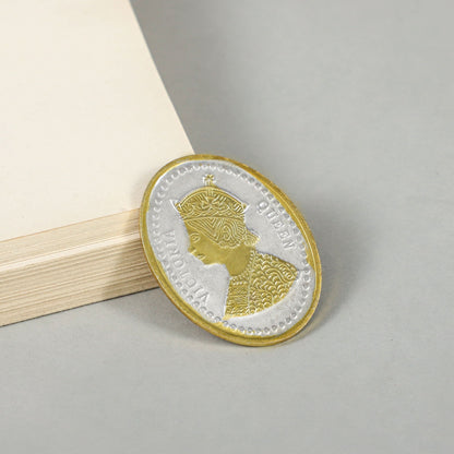 Golden Queen Coin- Elegant silver coin with intricate gold polish