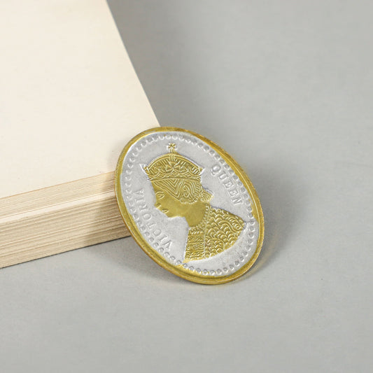 Golden Queen Coin- Elegant silver coin with intricate gold polish