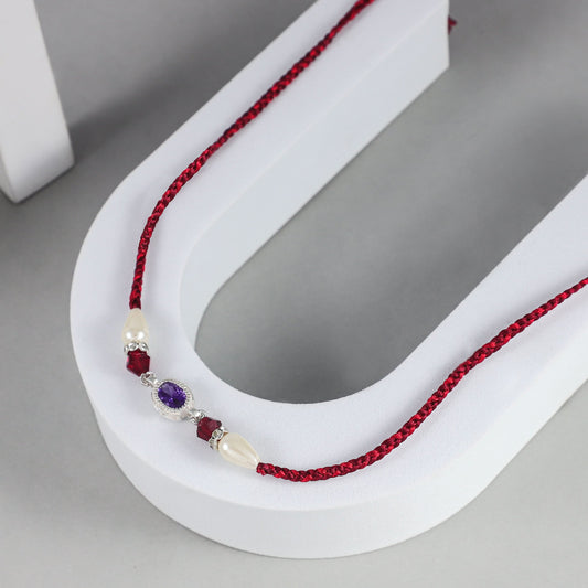 Royal Purple Stone Silver Rakhi with Pearl and Crystal Beads