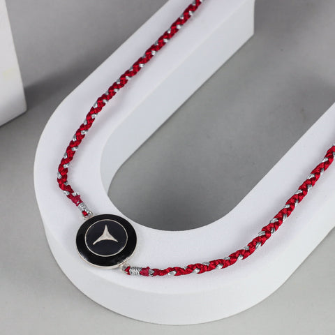 Bold Black Emblem Silver Rakhi on Red-Silver Braided Thread