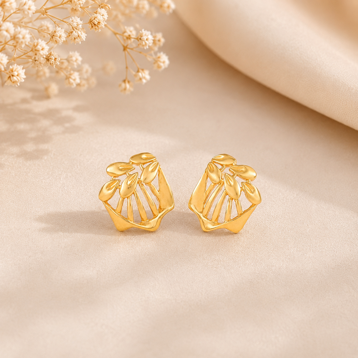 Artistic Leaf Studs Gold Earrings