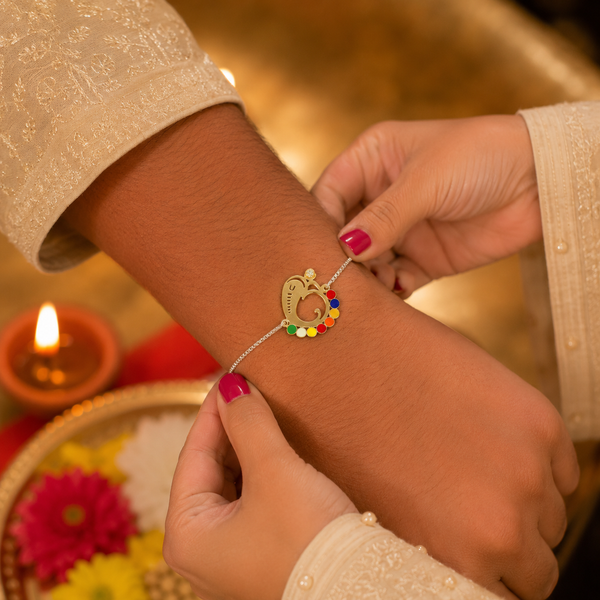 Golden Om Ganesha Silver Rakhi