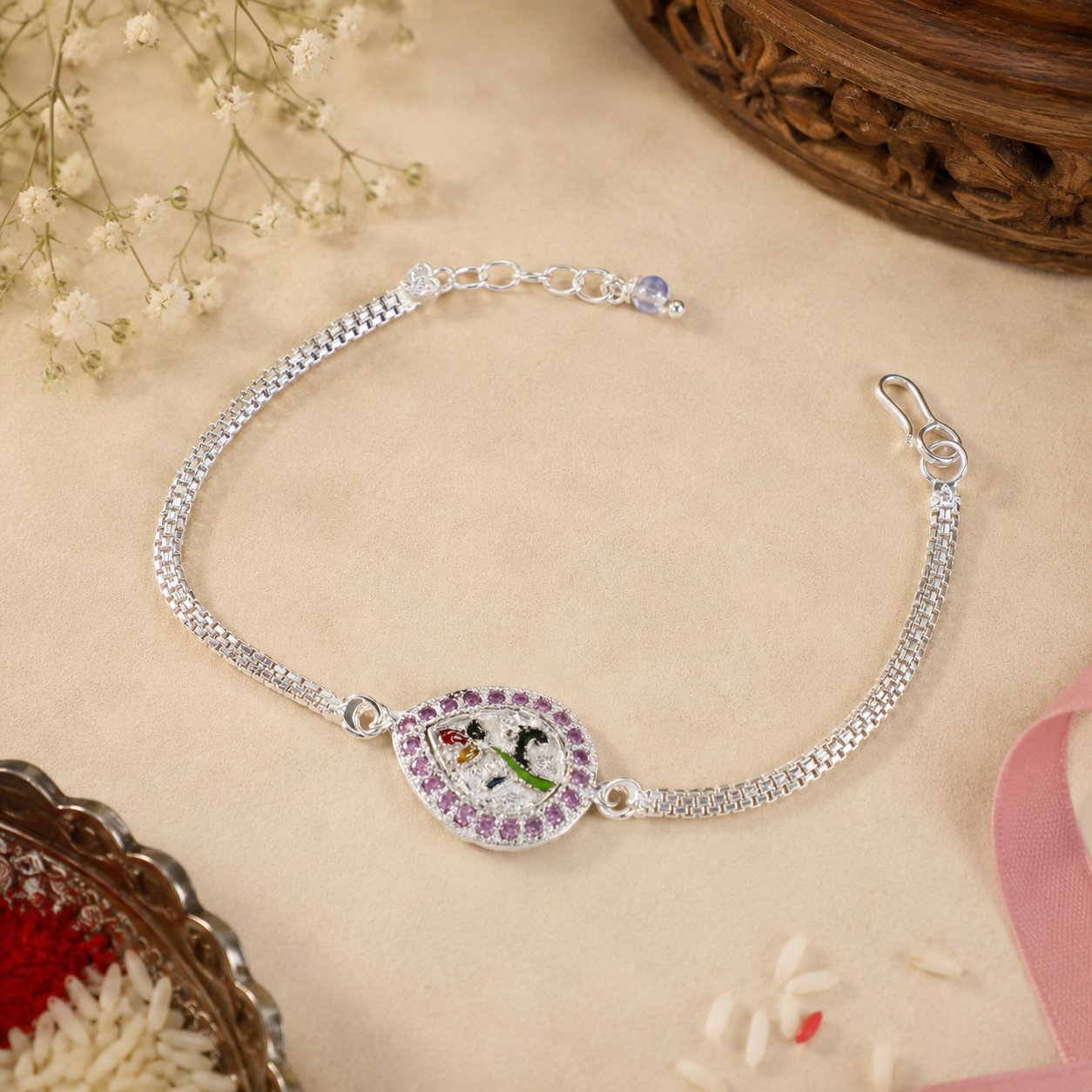 Peacock Motif Silver Rakhi