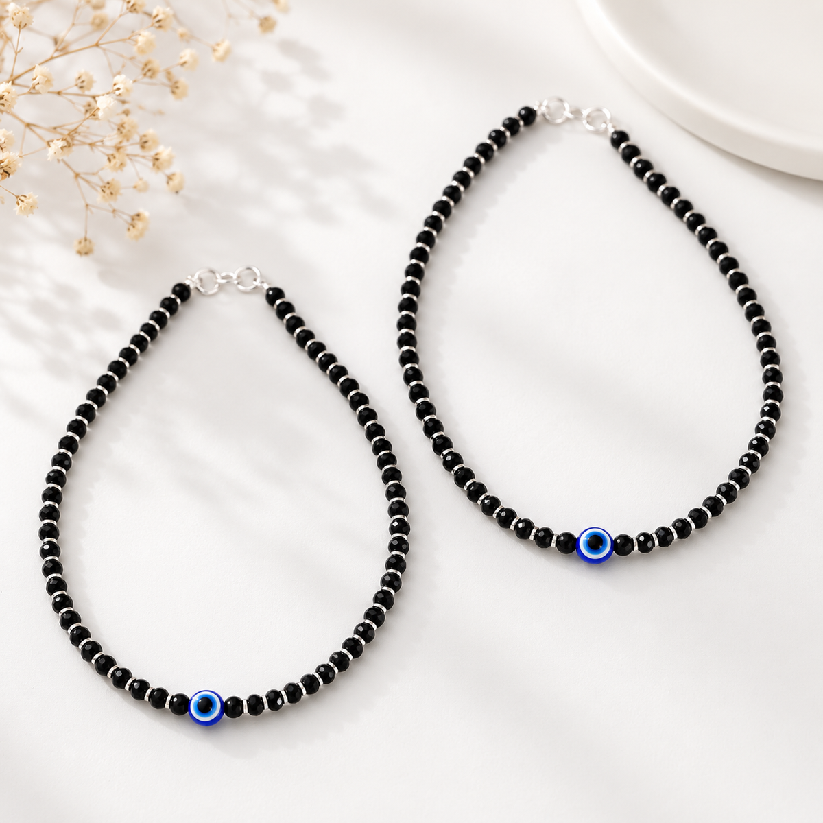 Risha Black Bead Eye Silver Anklets