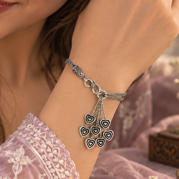 Aarohi Hearts Tassel Silver Bracelet