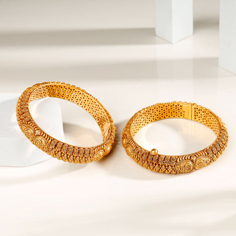 Kanika Carved Design Gold Bangles