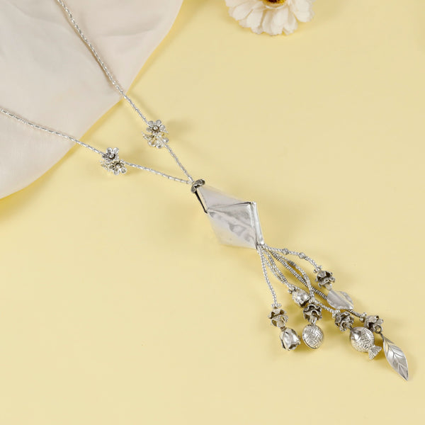 Gauri Silver Necklace With Intricate Charms