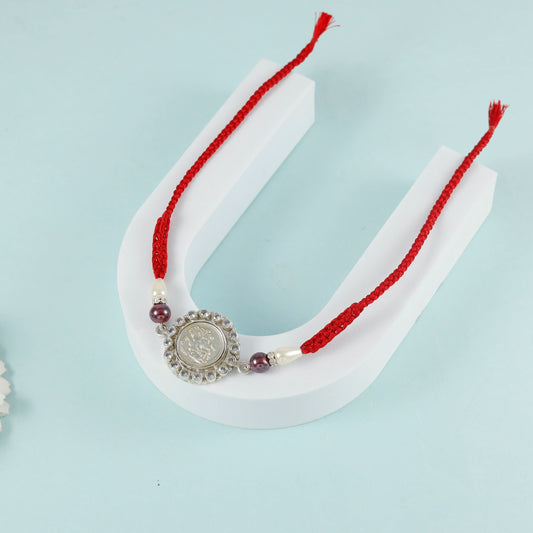 Silver Fancy Rakhi with Dori Tie