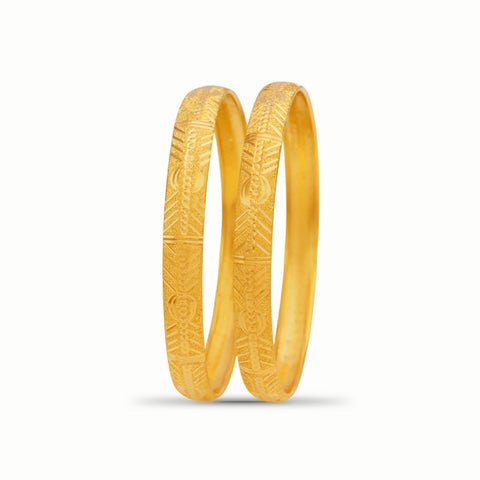 Elegant Gold Bangles With Traditional Craftsmanship