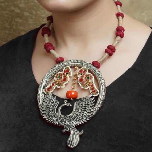 Navya Dual Tone Silver Necklace With Peacock Motif
