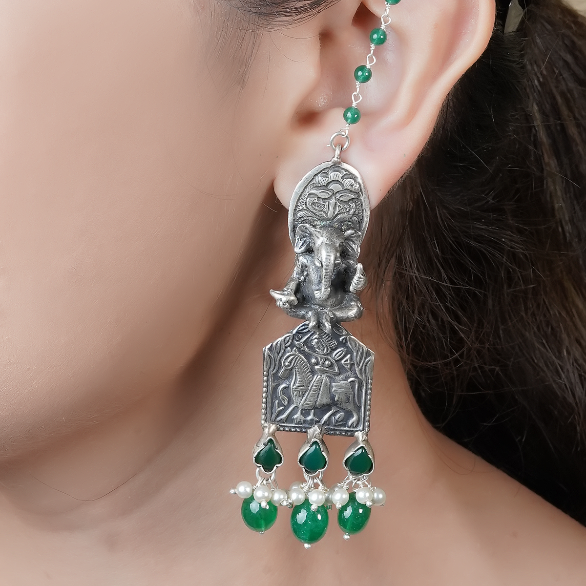 Dityaa Green Silver Earrings with Deity Motif