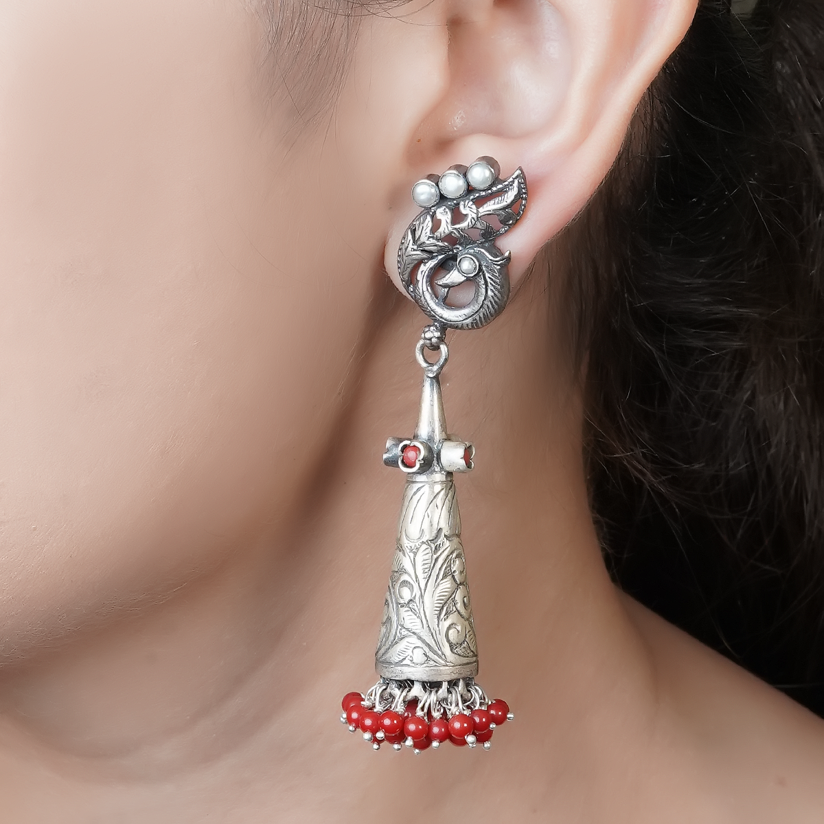 Niya White Silver Earrings with Peacock Motif