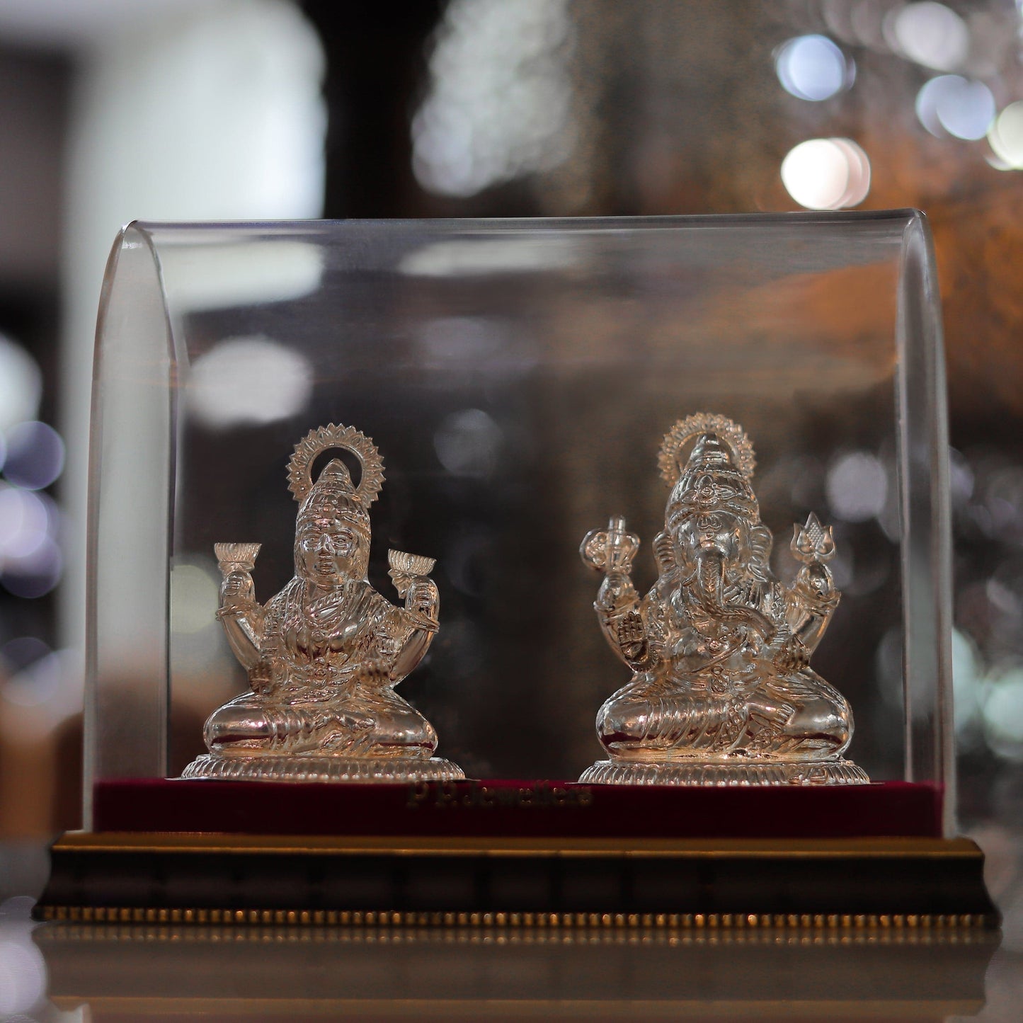 Pleasing Silver Laxmi Ganesha Idol